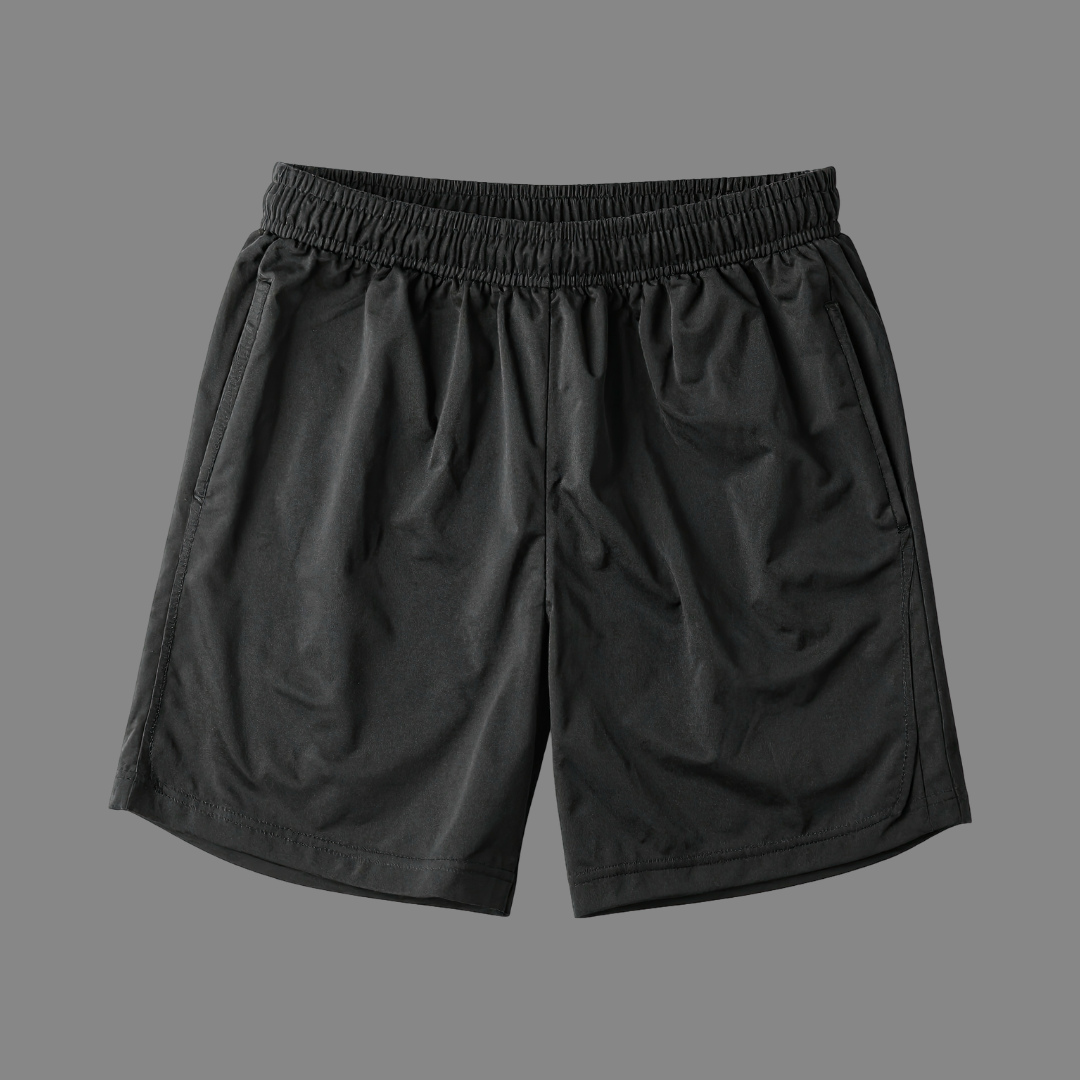 Black athletic shorts with elastic waistband and side pockets, displayed flat on a gray background